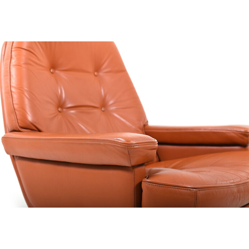 Fauteuil lounge vintage pivotant en cuir