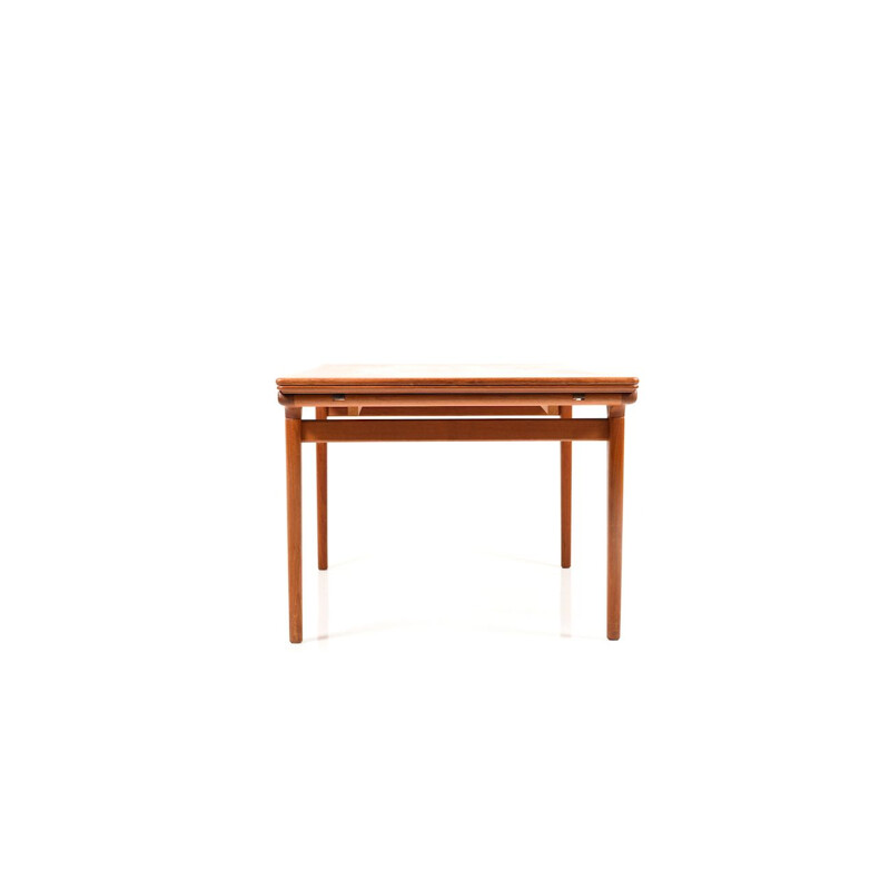 Vintage extendable dining table in teak by Johannes Andersen for Uldum