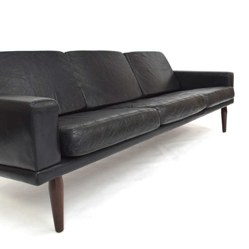 Living room set in black leather and teak by Bovenkamp