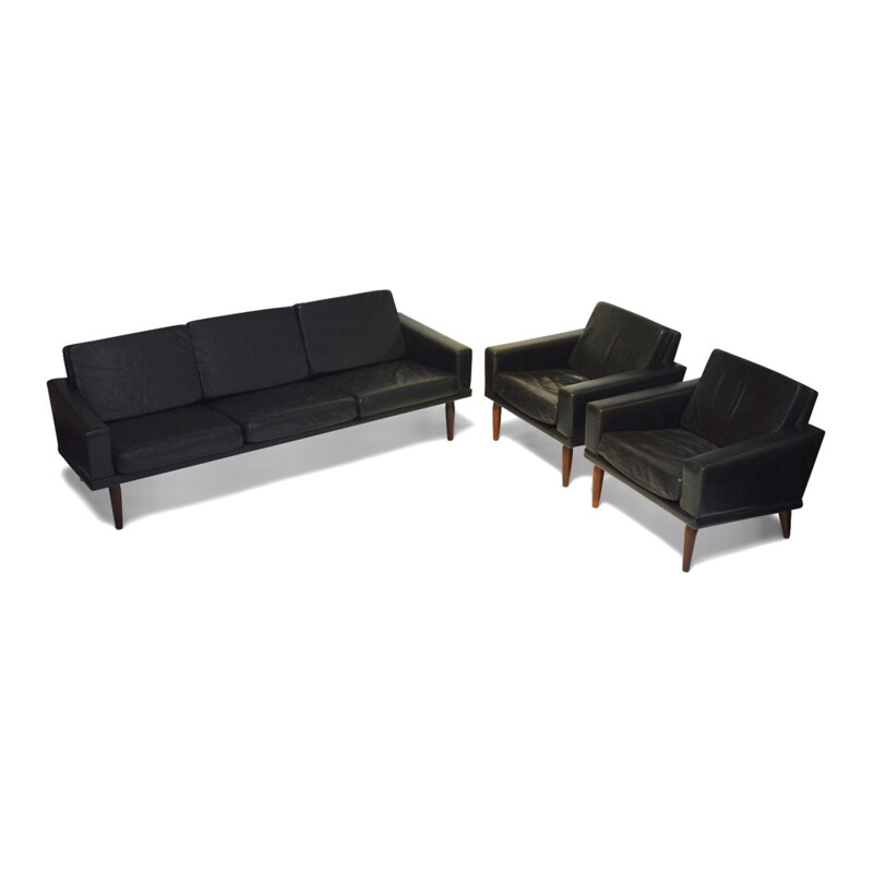 Living room set in black leather and teak by Bovenkamp