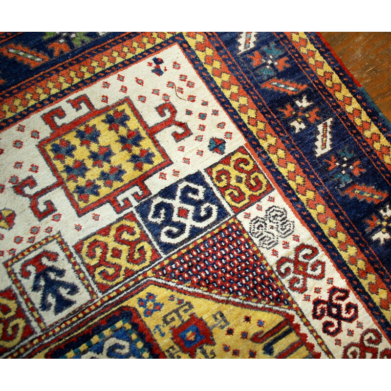 Handmade antique Caucasian Kazak Karachov rug 