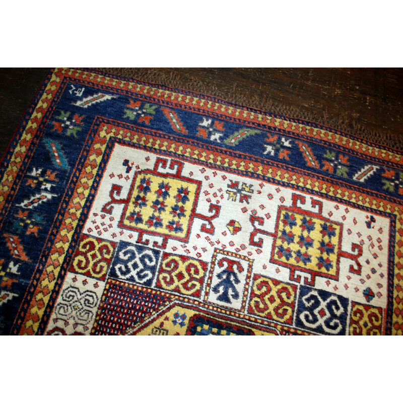 Handmade antique Caucasian Kazak Karachov rug 