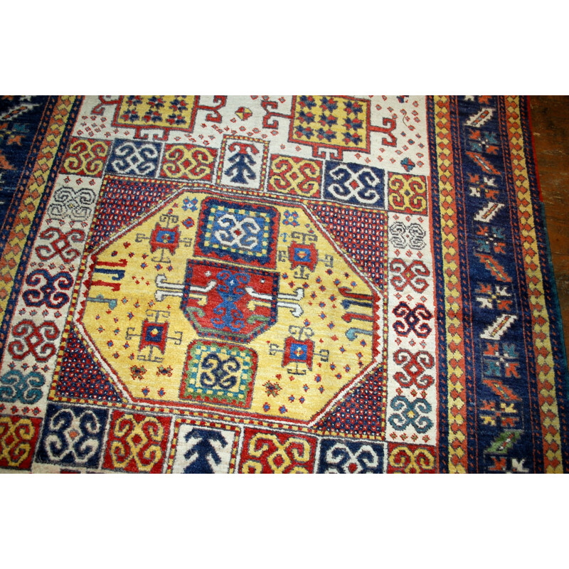Handmade antique Caucasian Kazak Karachov rug 