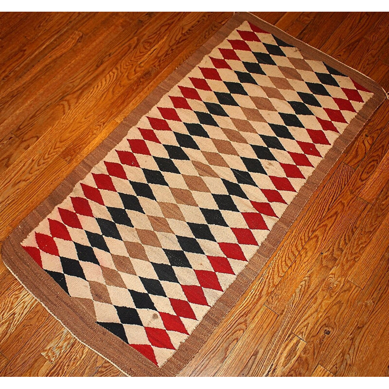 Vintage American-Indian Navajo rug in wool