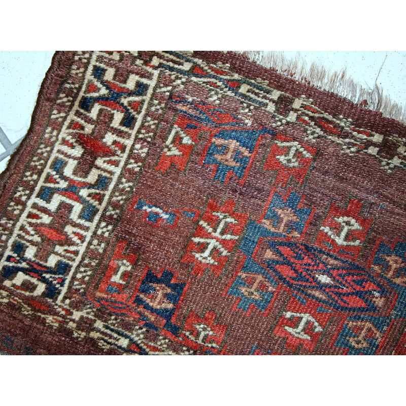 Handmade antique collectible dark burgundy rug by Turkmen Yomud - 1930s