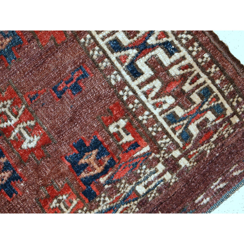 Handmade antique collectible dark burgundy rug by Turkmen Yomud - 1930s