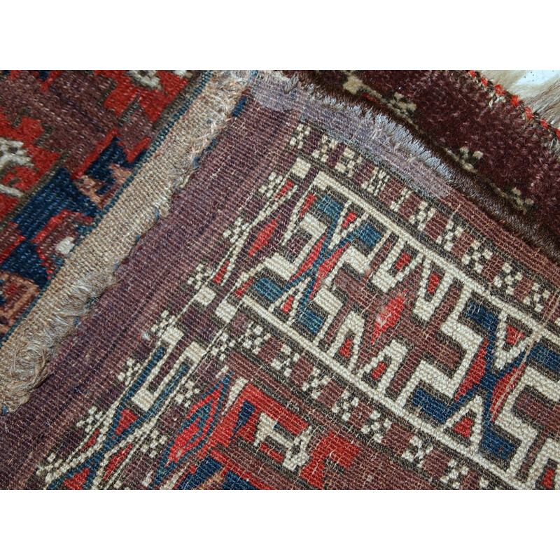 Handmade antique collectible dark burgundy rug by Turkmen Yomud - 1930s