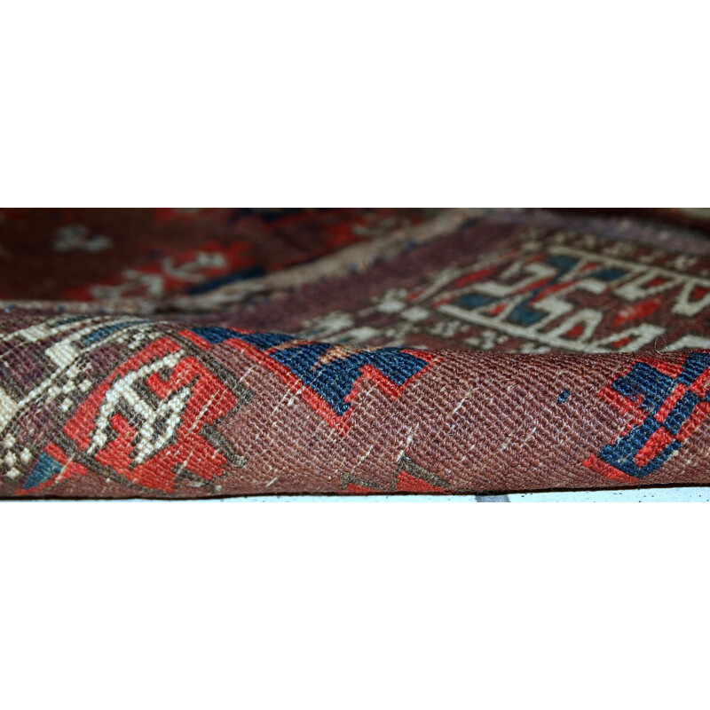 Handmade antique collectible dark burgundy rug by Turkmen Yomud - 1930s