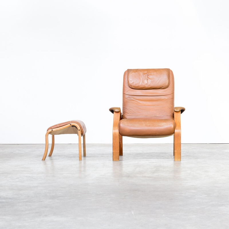 Brown armchair and ottoman by Oddvin Rykken for Rykken & Co