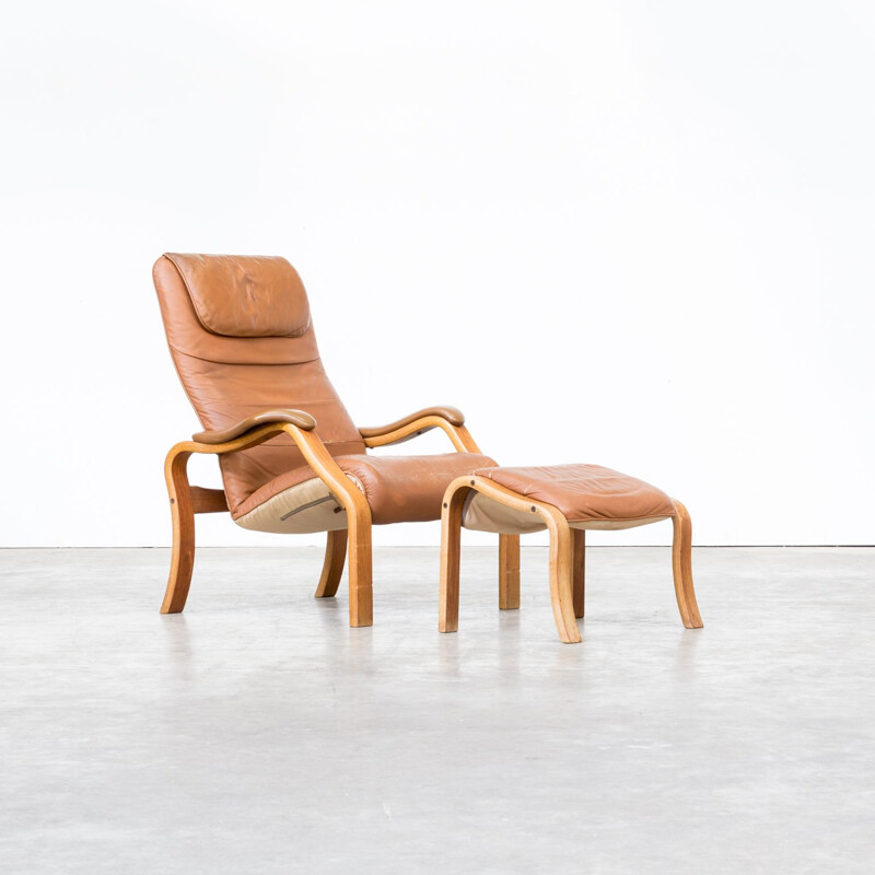 Brown armchair and ottoman by Oddvin Rykken for Rykken & Co