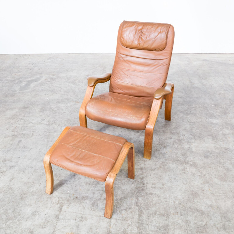 Brown armchair and ottoman by Oddvin Rykken for Rykken & Co