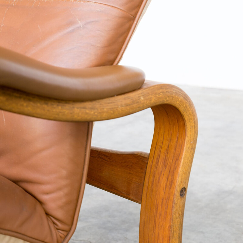 Brown armchair and ottoman by Oddvin Rykken for Rykken & Co