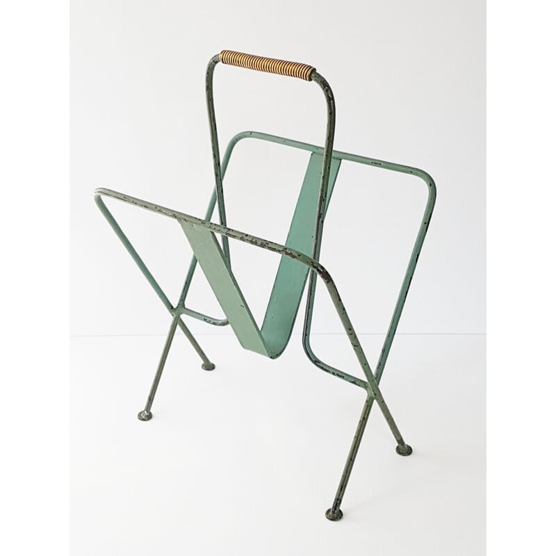 Vintage magazine rack by Jacques Adnet