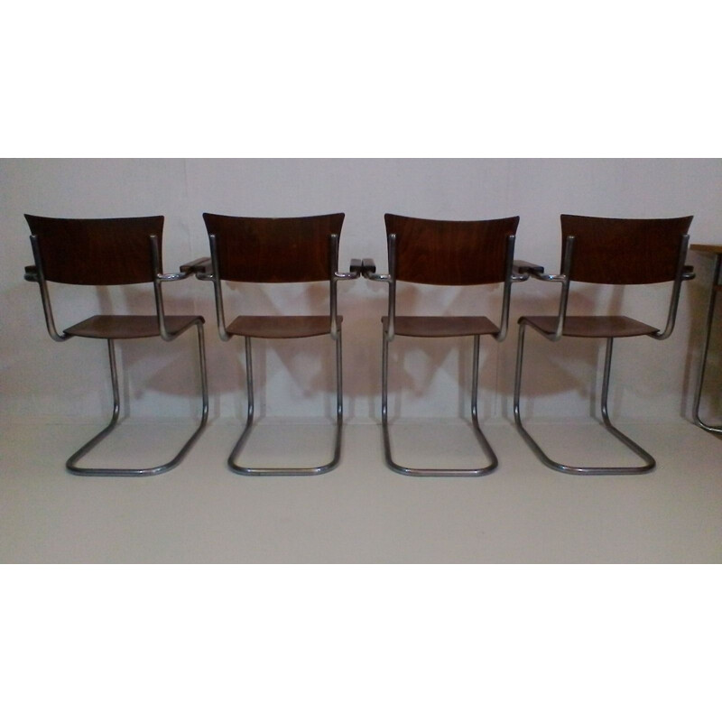 Vintage dining set by Robert Slezák set in walnut and iron