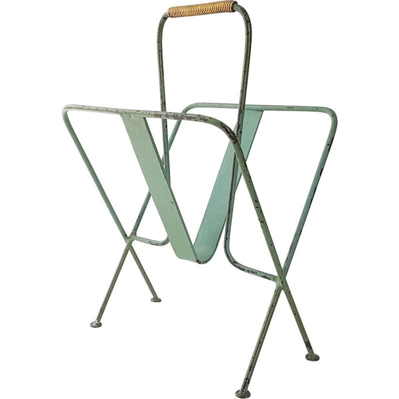 Vintage magazine rack by Jacques Adnet