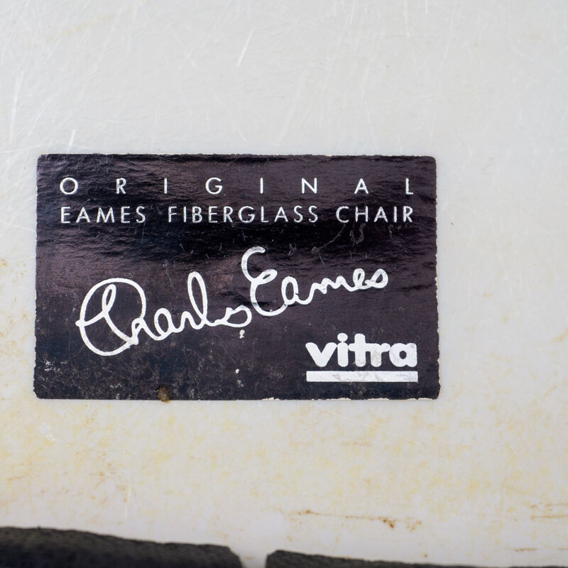 Vintage chair by Charles and Ray Eames in glass