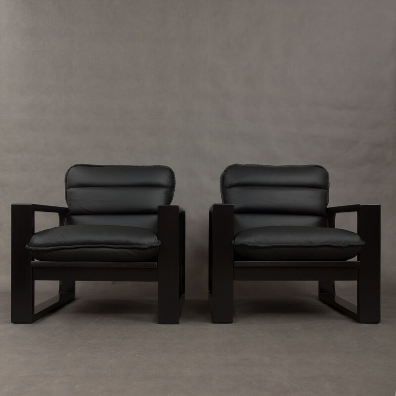 Set of 2 black lounge chairs in wood and leather by Miroslav Navratil