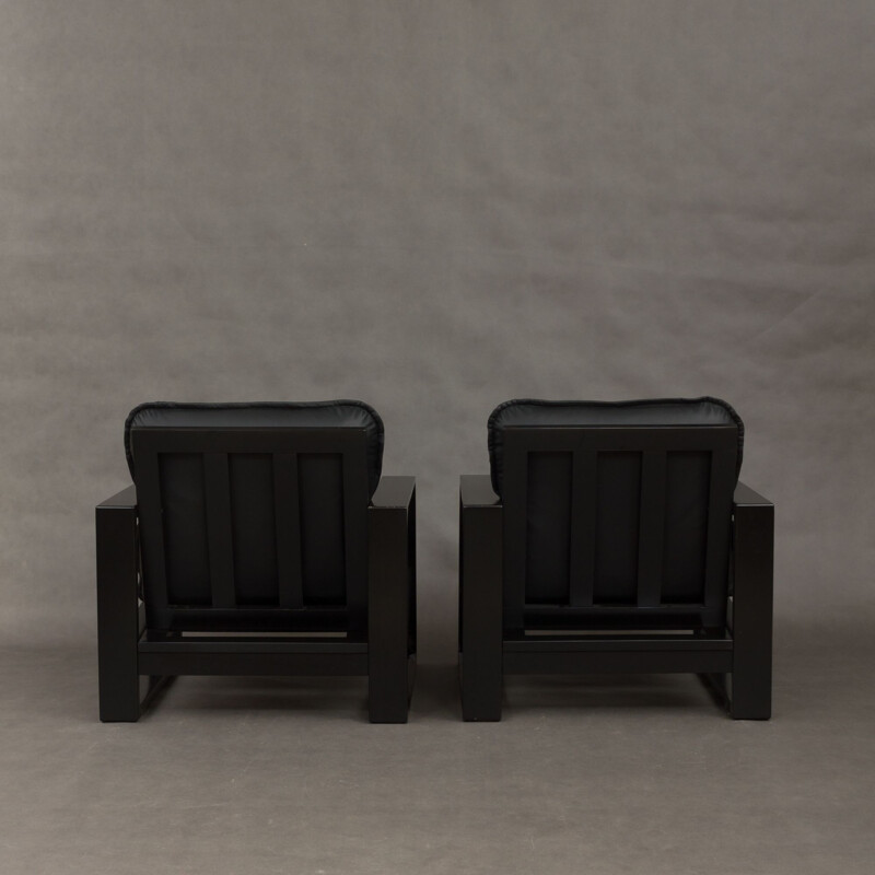 Set of 2 black lounge chairs in wood and leather by Miroslav Navratil