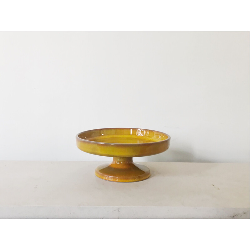 Yellow ceramic bowl with pedestal by Jacques and Dani Ruelland