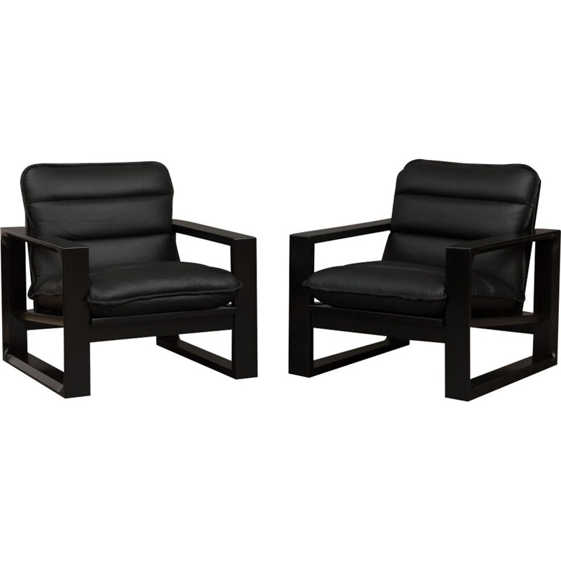 Set of 2 black lounge chairs in wood and leather by Miroslav Navratil
