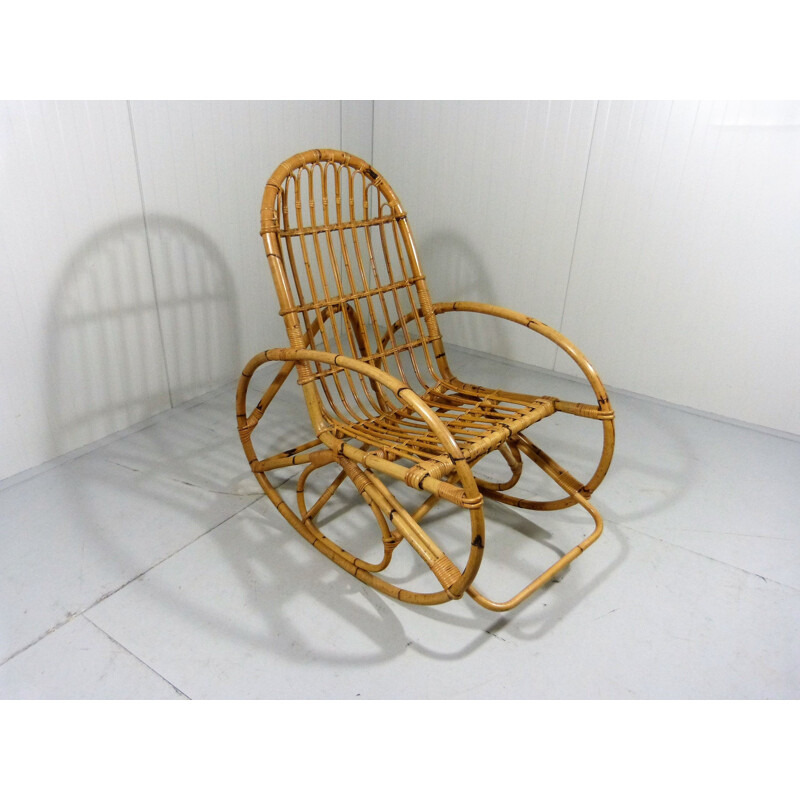Vintage rattan and wood rocking chair