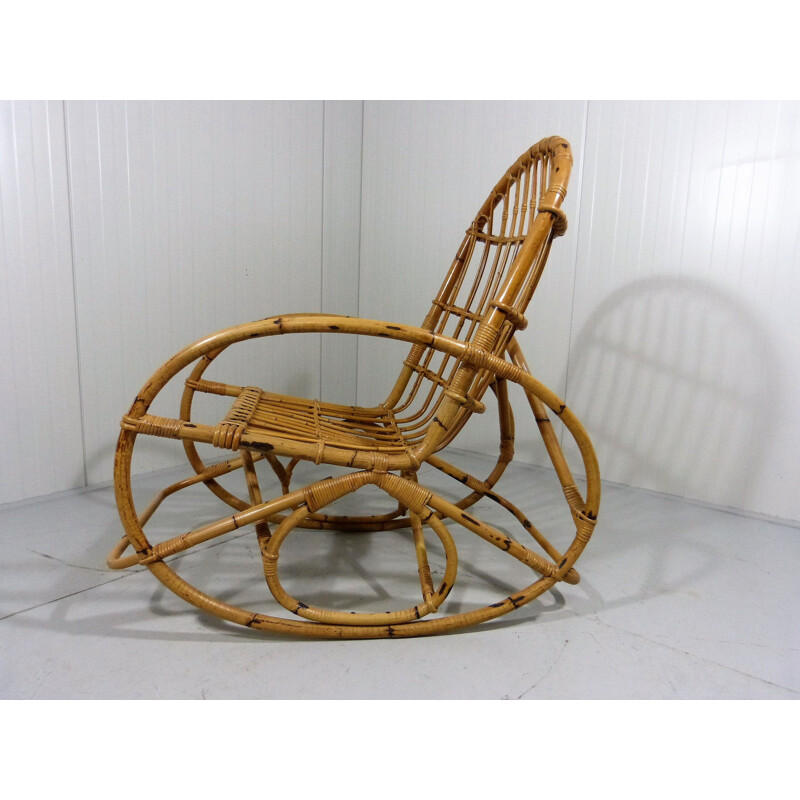 Vintage rattan and wood rocking chair