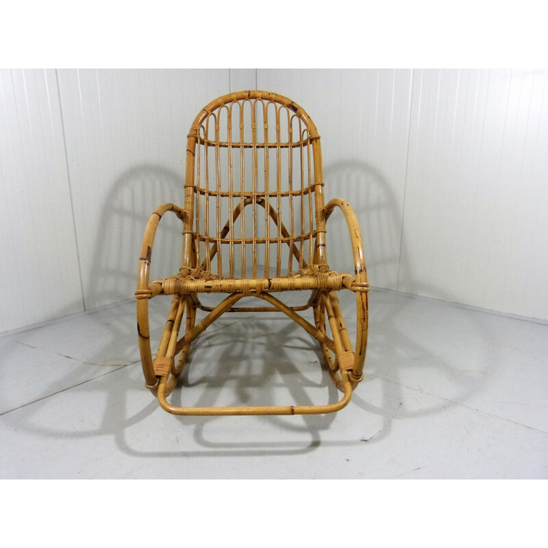 Vintage rattan and wood rocking chair