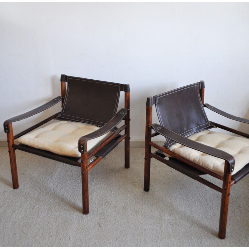 Pair of "Sirrocco" rosewood and leather lounge chairs by Arne Norell