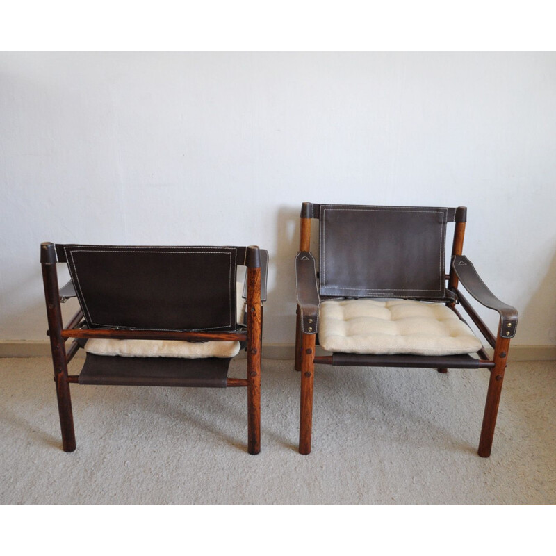 Pair of "Sirrocco" rosewood and leather lounge chairs by Arne Norell