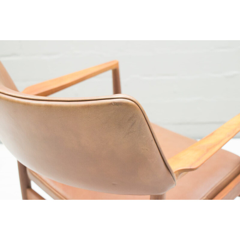 Chaise vintage scandinave en teck et chaise en cuir
