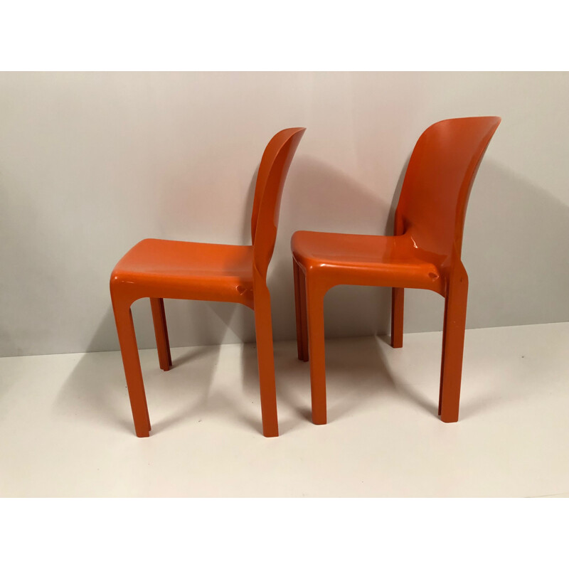 Set of 2 vintage orange chairs "Selene" by Vico Magistretti for Artemide