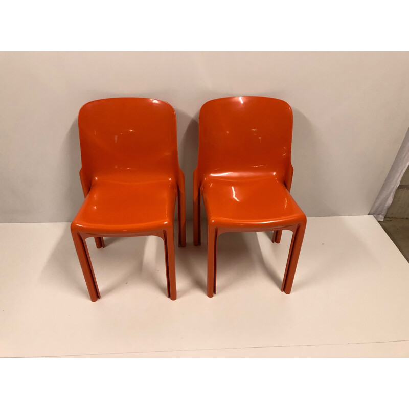 Set of 2 vintage orange chairs "Selene" by Vico Magistretti for Artemide