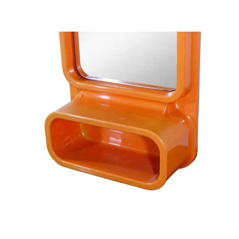 Vintage orange mirror in plastic