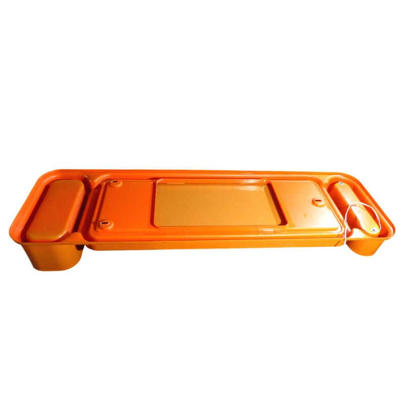 Vintage orange mirror in plastic