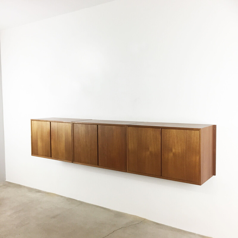 Vintage Danish wall board in teak by Poul Cadovius