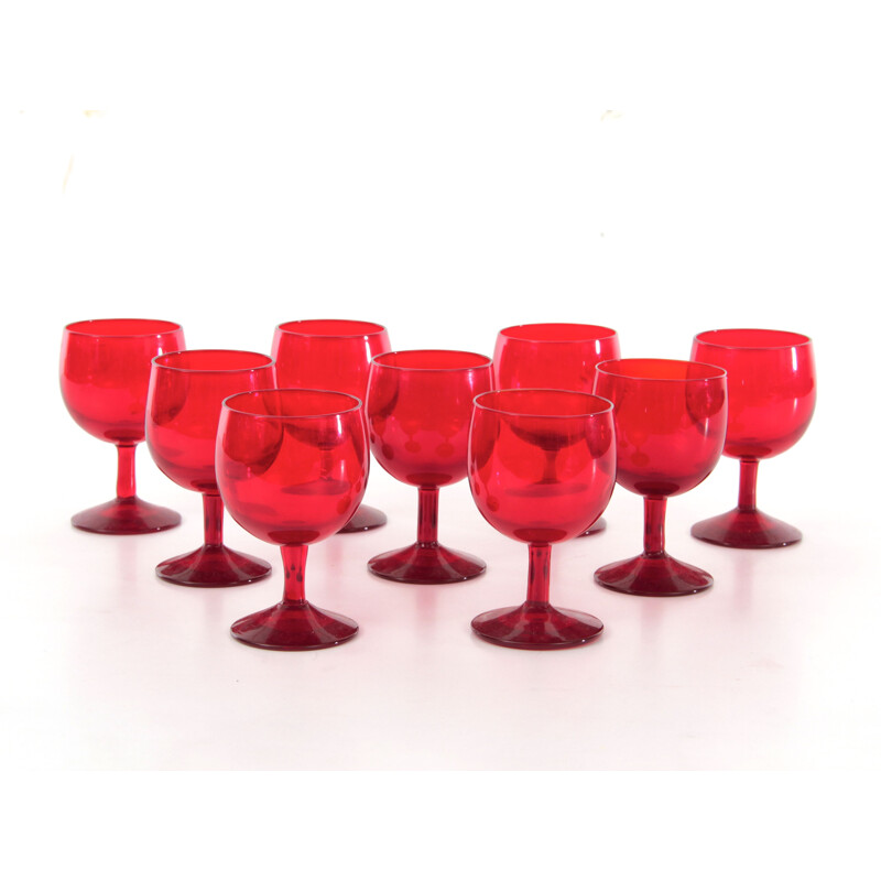 Set of 9 red glasses by Kosta Boda