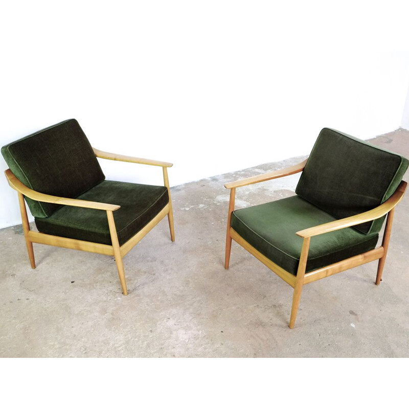 Pair of easy chairs in dark green velvet by Walter Knoll