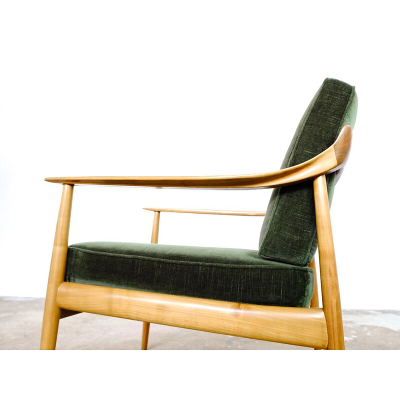 Pair of easy chairs in dark green velvet by Walter Knoll