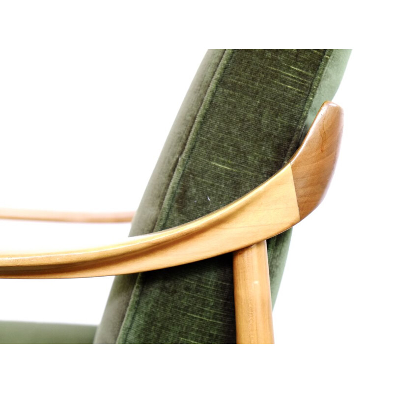 Pair of easy chairs in dark green velvet by Walter Knoll