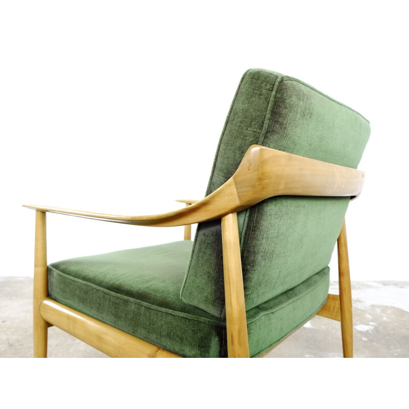 Pair of easy chairs in dark green velvet by Walter Knoll
