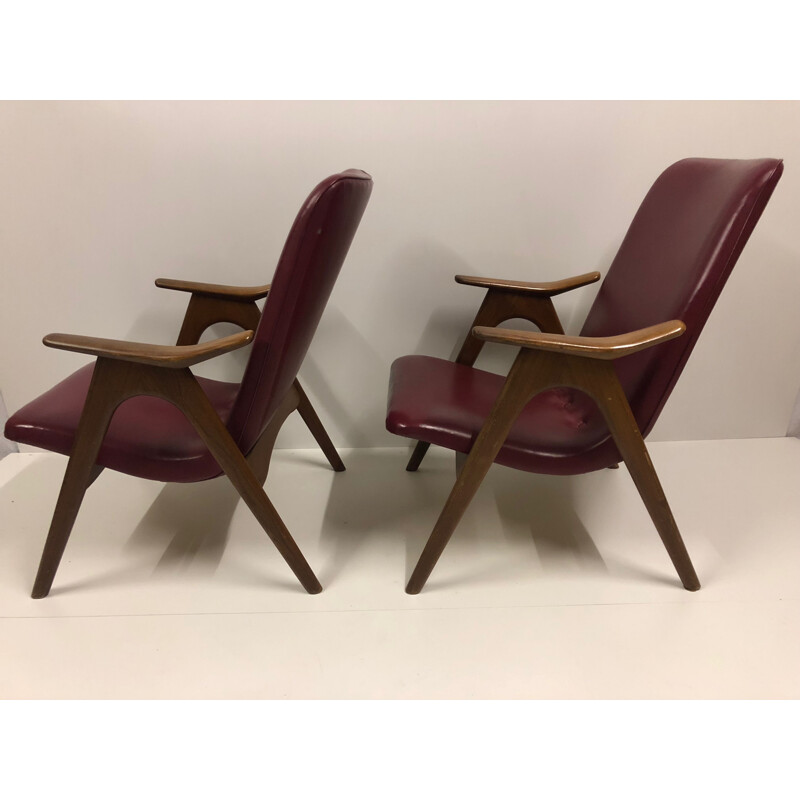 Suite van 2 vintage bordeauxrode fauteuils van Louis van Teeffelen voor WéBé