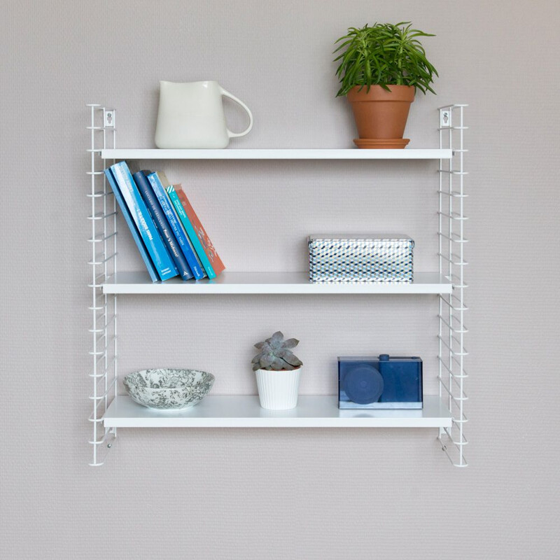 White "Tomado" shelves by Adrian Dekker 