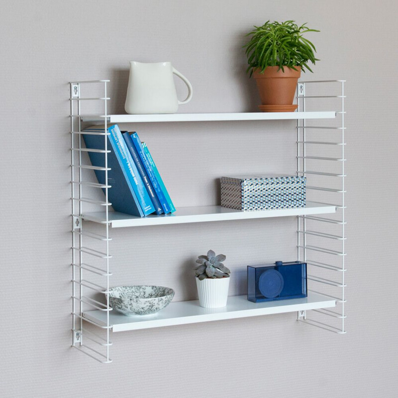 White "Tomado" shelves by Adrian Dekker 