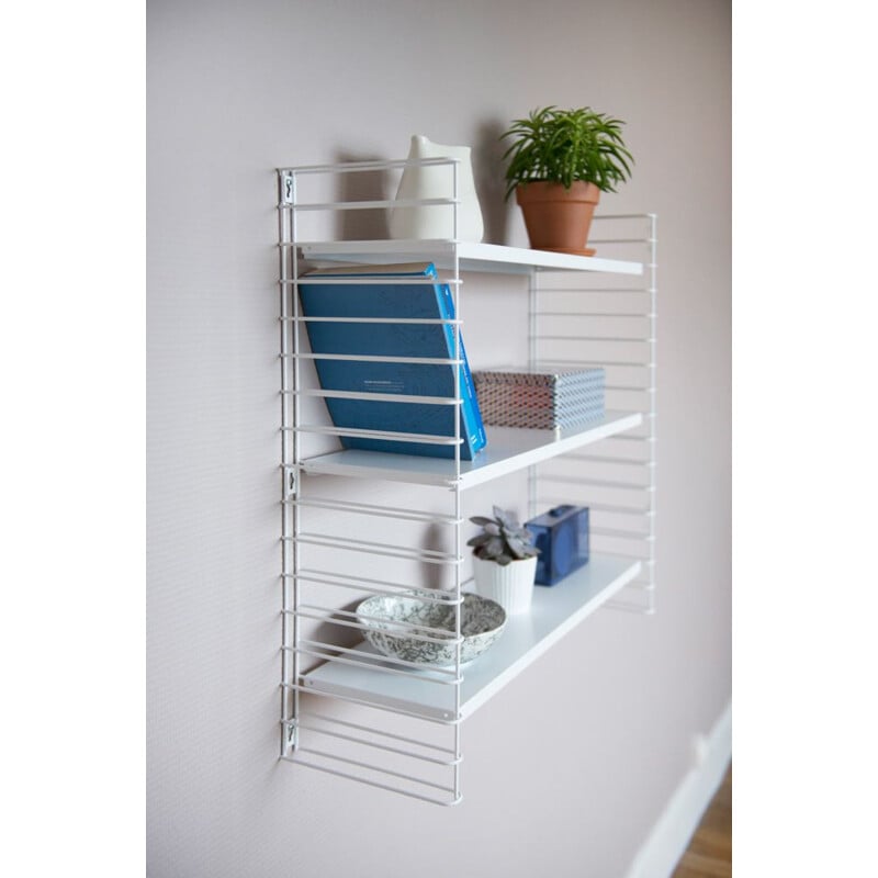 White "Tomado" shelves by Adrian Dekker 