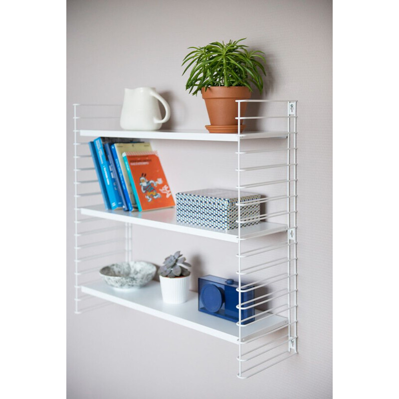 White "Tomado" shelves by Adrian Dekker 