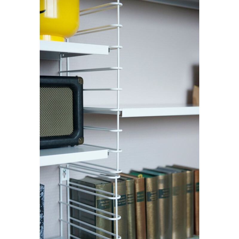 White "Tomado" bookcase by Adrian Dekker