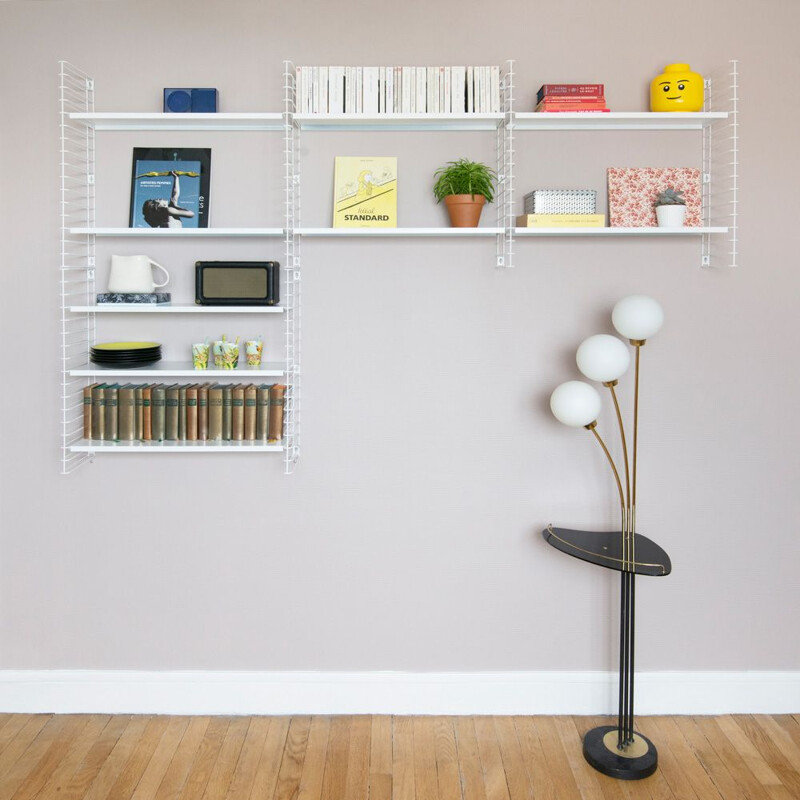 White "Tomado" bookcase by Adrian Dekker