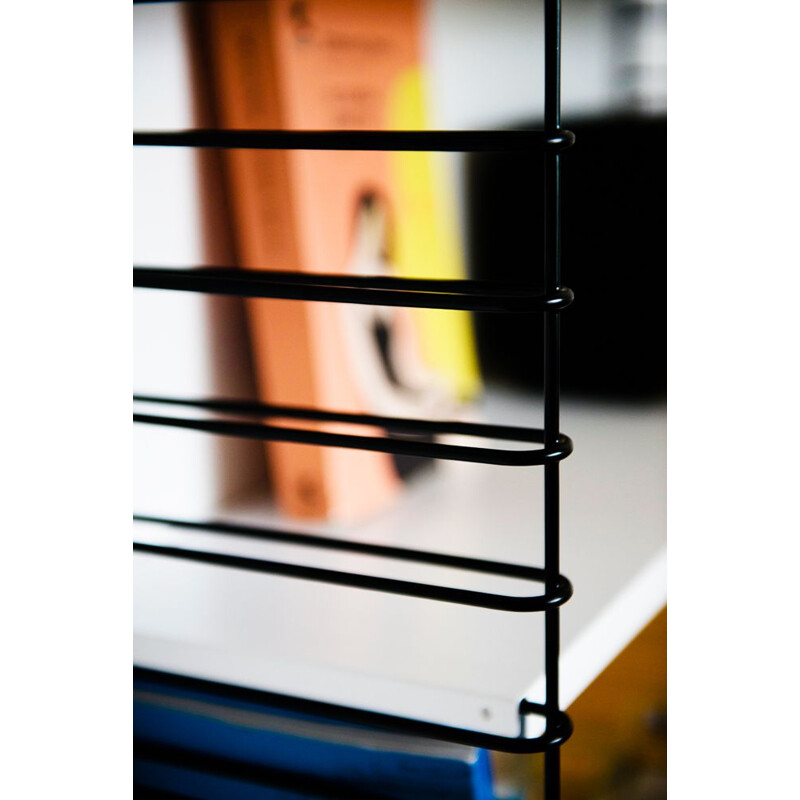 Black and white shelf system by Adrian Dekkker for Tomado