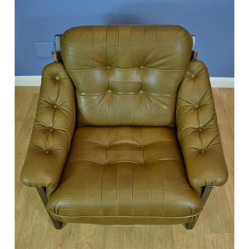 Vintage Danish armchair in brown leather