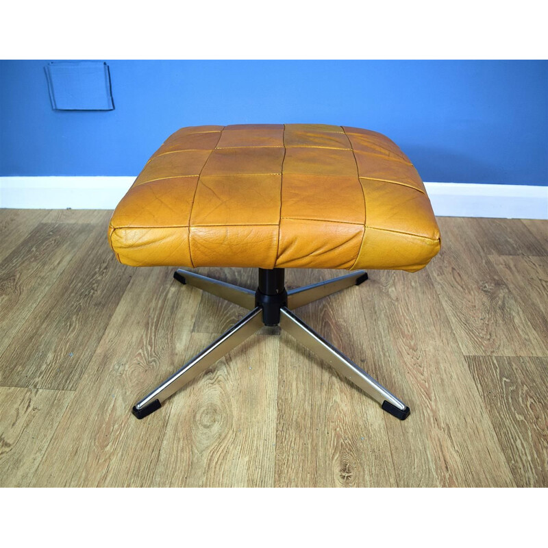 Vintage Danish swivel ottoman in tan leather